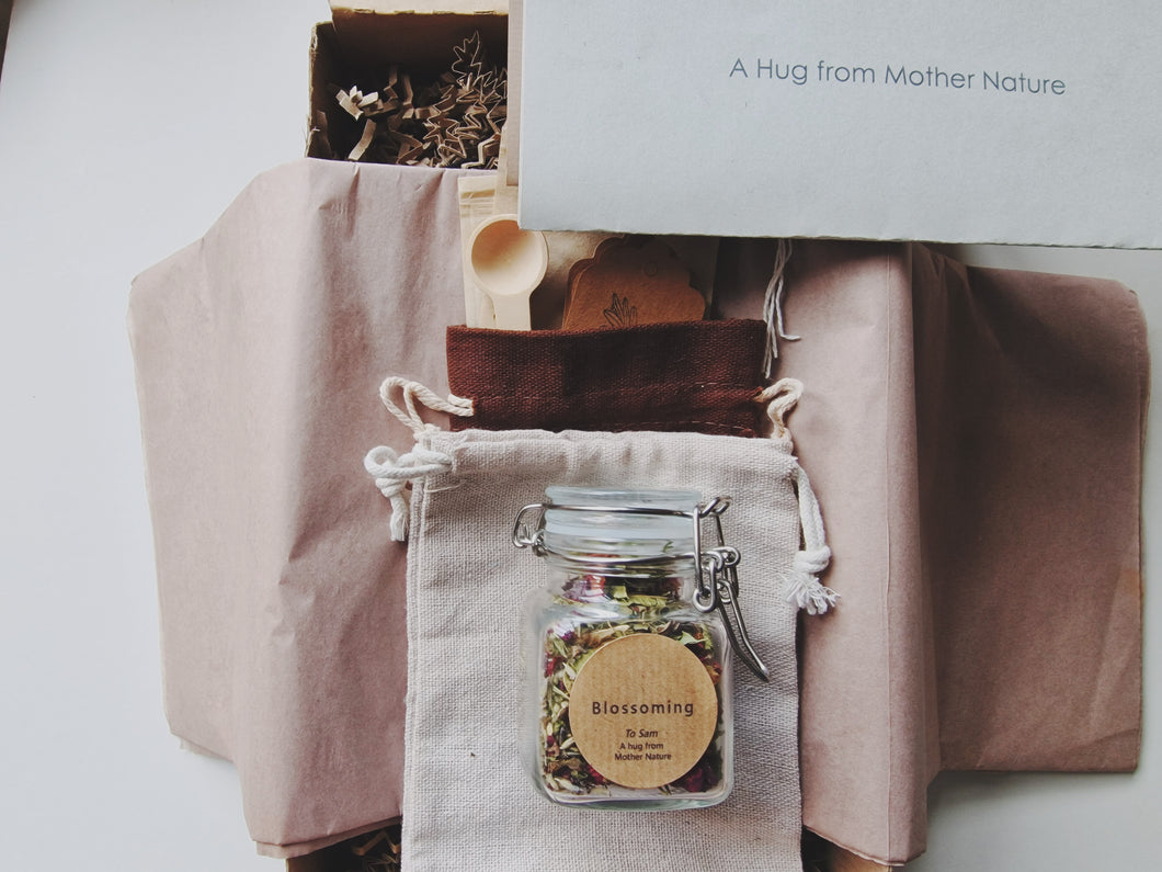 Mindfulness tea experience with eco-friendly bag, wooden spoon and tea accessories